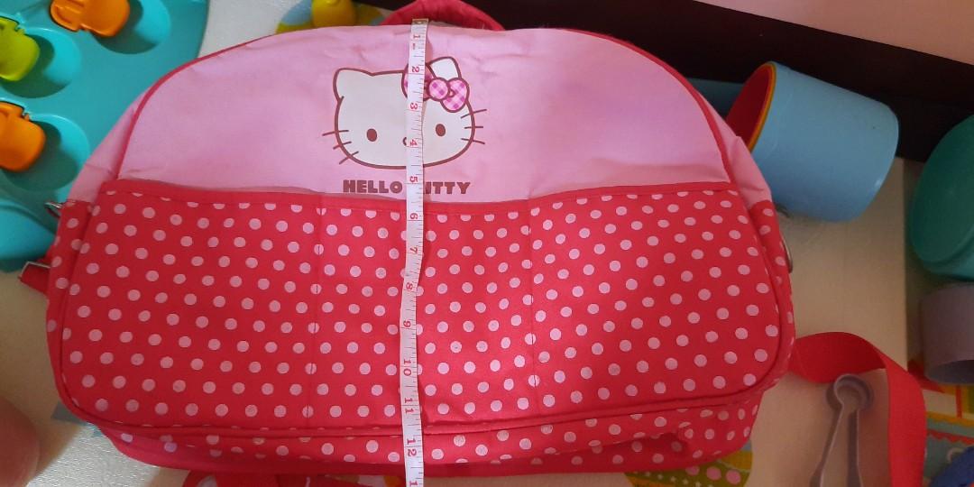 Hello Kitty Diaper Bag (Category: Diaper Bags & Wetbags) located in Imus. Submitted by lynerodriguez (Listing ID 1017586228, Image 3). Description: pre-loved hello kitty diaper bag. in good condition. need lang labhan kasi nasa taguan. freebies HK milk dispenser 2 HK wideneck bottle 1 HK small neck bottle 1 HK Training cup.