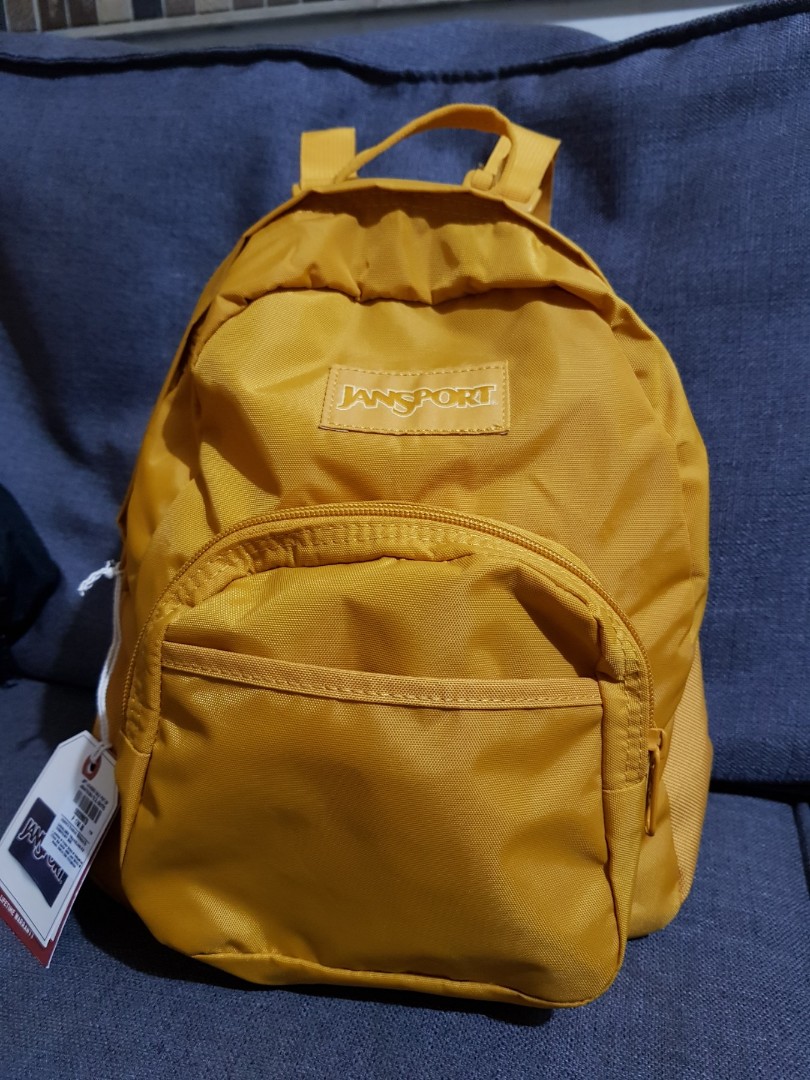 mustard yellow jansport backpack