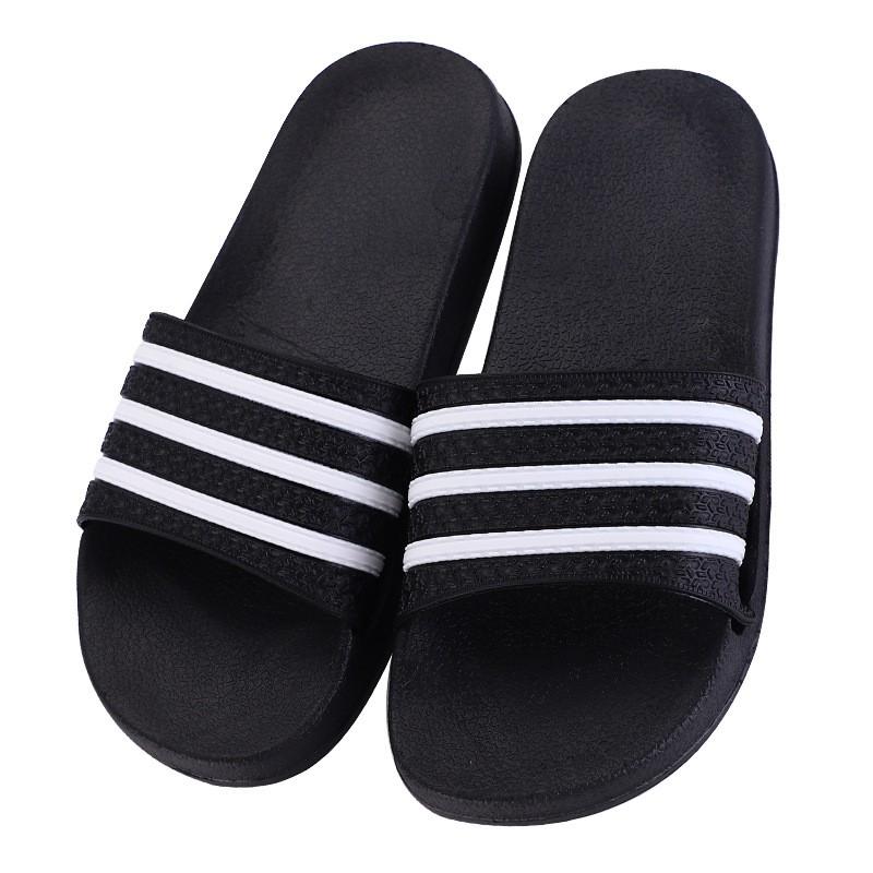 all black slippers