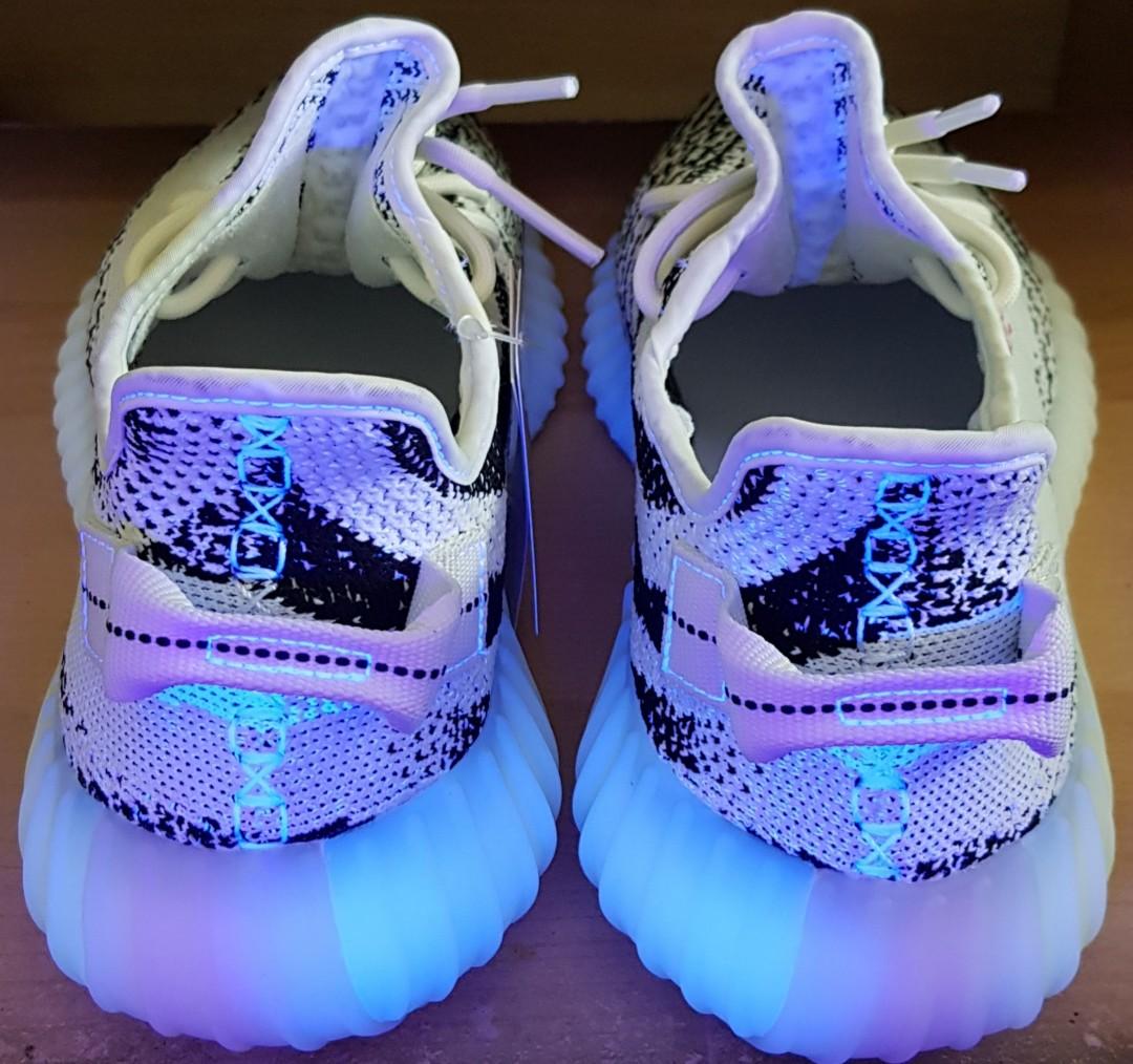Yeezy zebra on sale uv light
