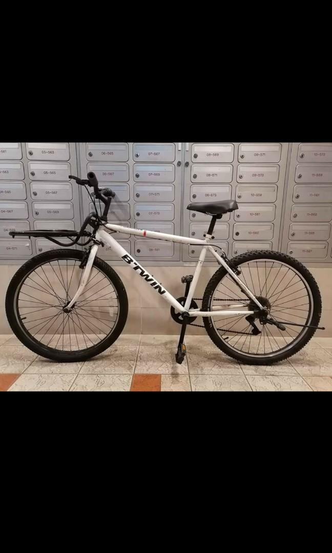 Btwin rockrider 100 adult size L mountain bike with front rack and
