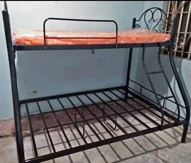 double deck bunkbed (Category: Bed Frames & Mattresses) located in Manila. Submitted by zhellesperas (Listing ID 1019577849, Image 2). Description: double deck tubing rtype style..semi double up en double down.size 36x48x75,good quality and heavy duty.black color only....we accept bulk orders and ready for delivery....