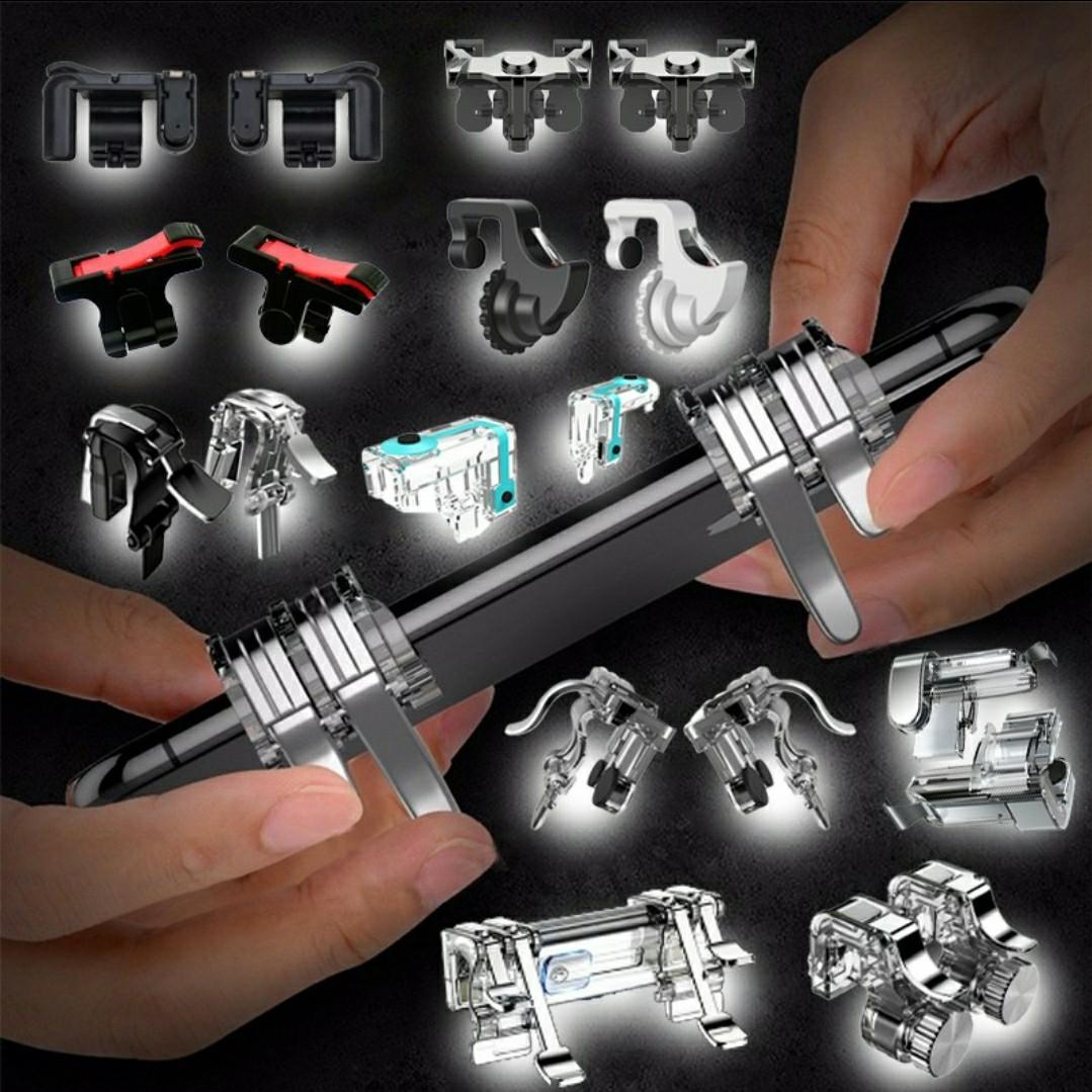 Game Trigger (Category: Controllers) located in Singapore. Submitted by mufinn (Listing ID 1012172225, Image 1). Description: Specification: 100% brand new with high quality Material: ABS + Metal Color: Transparent Suitable for: 4-6.5inch phone Mobile Game PUBG Assist Button, Compatible with 4-7 inch Phone Zero delay of the trigger button-zoom in / out faster, more real-world triggering experience Traction design-adjust the position of the trigge
