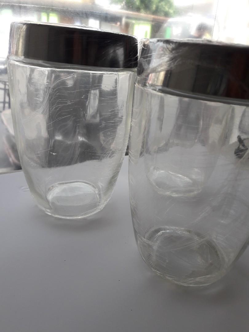 Glass Container (Category: Storage Boxes & Baskets) located in Las Pinas. Submitted by jaziyah4 (Listing ID 1019616619, Image 2). Description: new. conical glass jar with stainless steel lid. 45oz. 350 each 1,000 for the 3 jar.