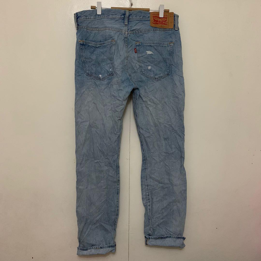 ripped levis 501