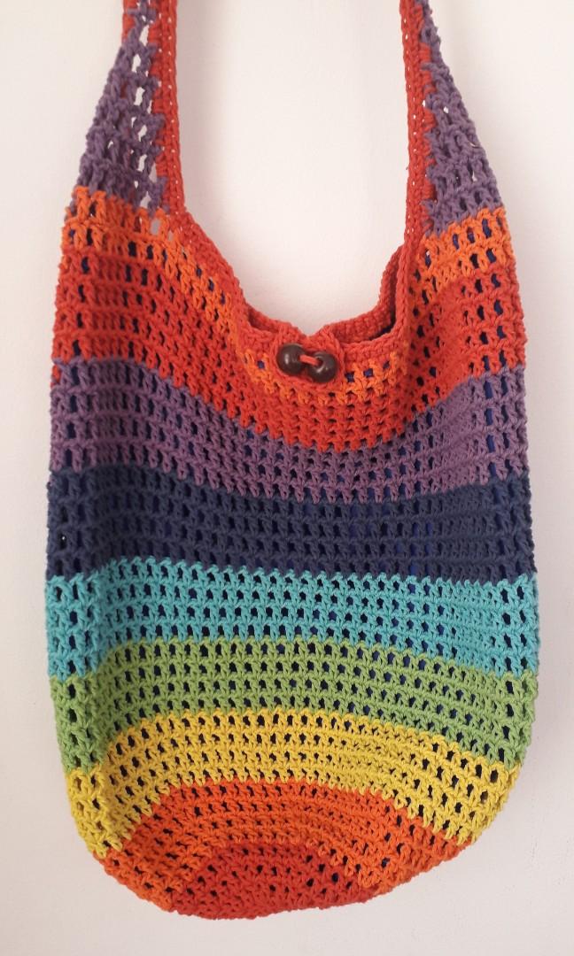 Thailand Crochet Bag (Category: Cross-body Bags) located in Las Pinas. Submitted by betchays (Listing ID 1019672858, Image 2). Description: Hand Knitted bag bought in Thailand (2018) *multi color *never used *no flaws MOP: GCash SF: Php75 - Metro Manila.