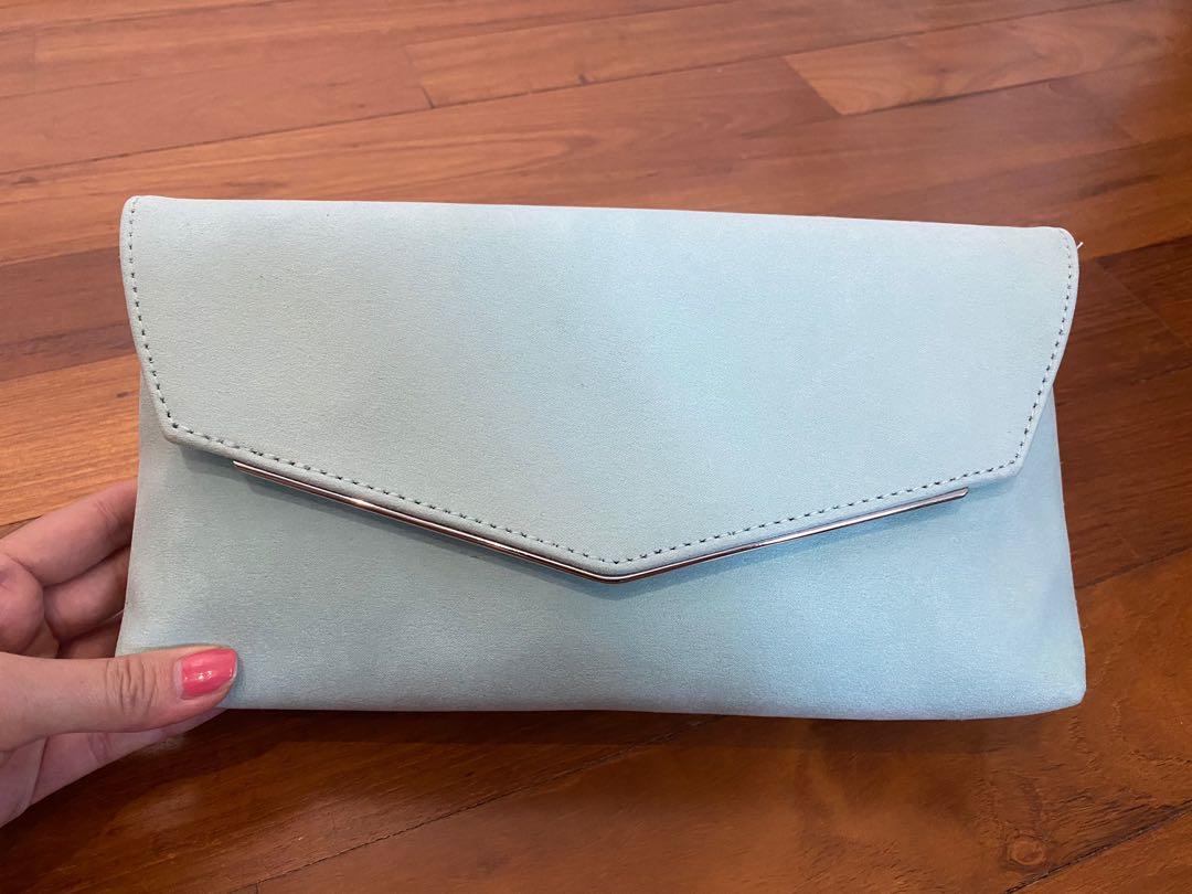 baby blue suede clutch bag
