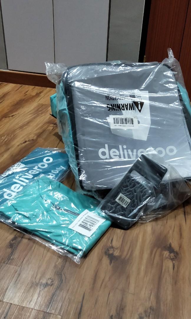 Deliveroo basic starter set (without the jacket) (Category: Motorcycle Accessories) located in Singapore. Submitted by sidekickmitos.1 (Listing ID 1019957102, Image 1). Description: Brand new never used before. Things included, the phone mount long sleeve t-shirt (size M) the delivery box itself. Price is negotiable for serious buyers. clearing store room space..