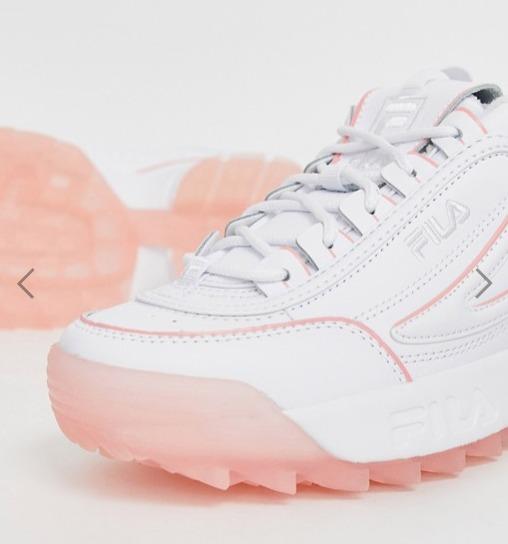 Fila Disruptor II Trainers in white with ice pink sole Women s