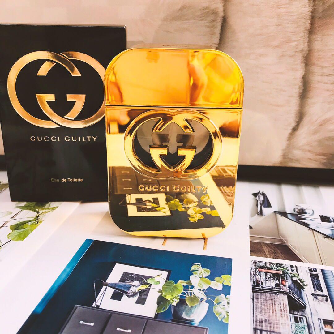 gucci perfume gold bottle