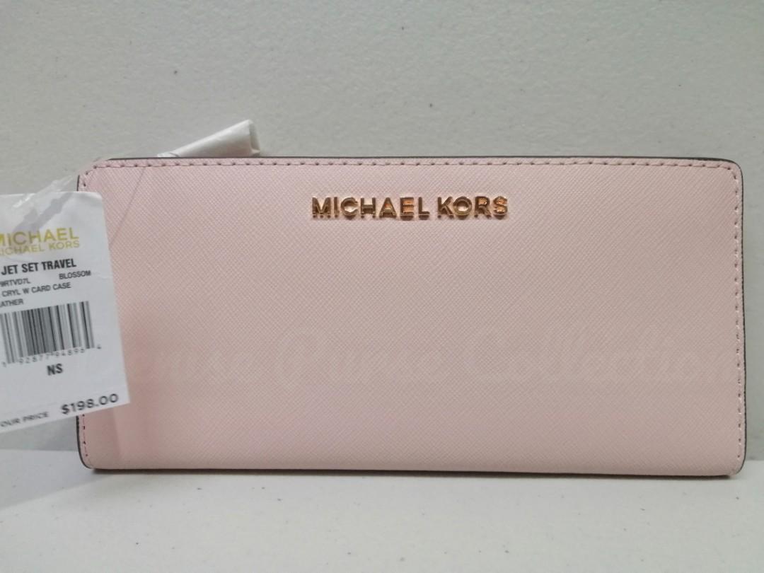 Michael Kors Jet Set Travel Large Card Case Carryall Wallet with Removable  ID Card Holder, Women's Fashion, Bags & Wallets, Wallets & Card holders on  Carousell