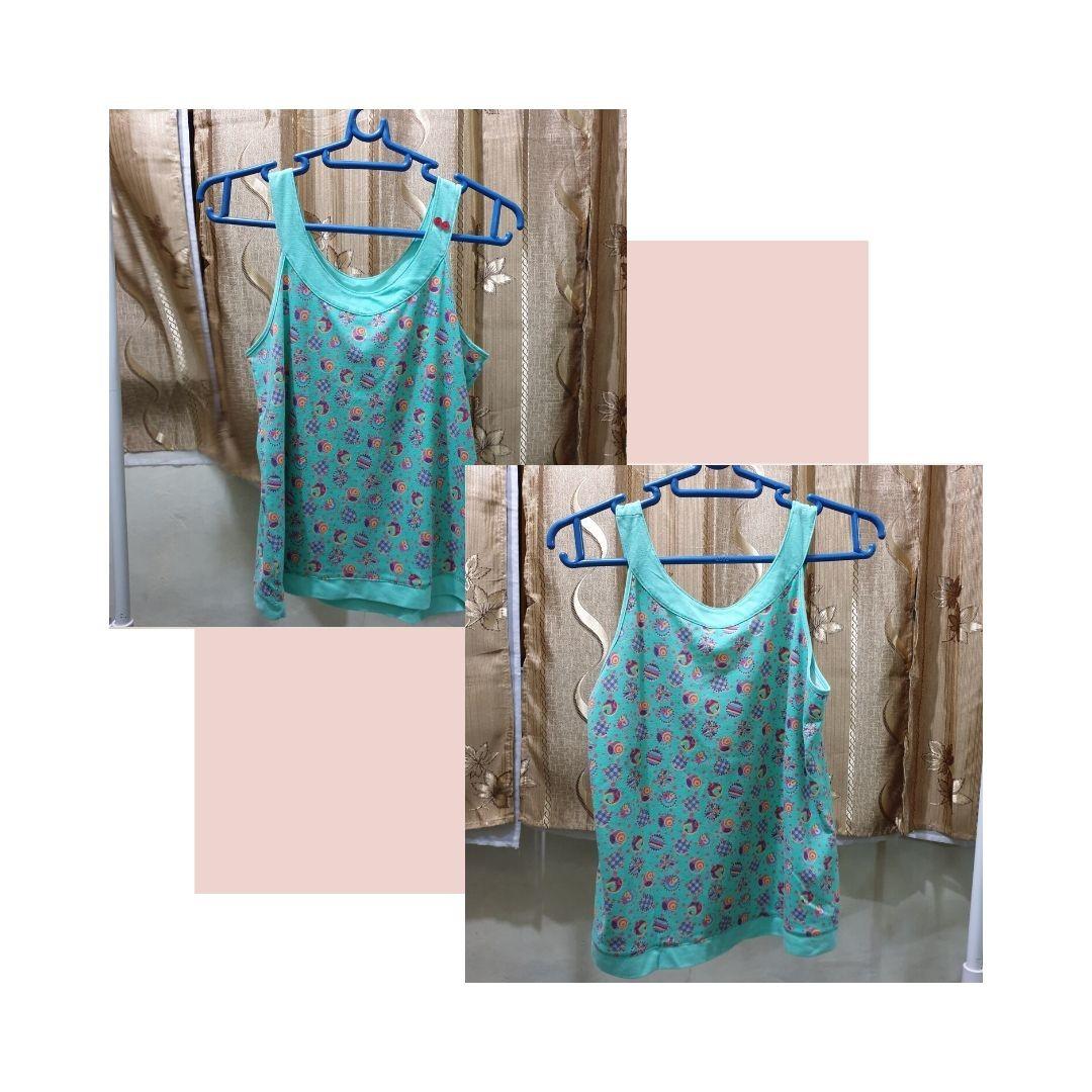 Printed Teal Tank Top (Category: Sleeveless) located in Caloocan City. Submitted by ancdeclutters (Listing ID 1019911411, Image 2). Description: Fits XS-M Barely Used Colorful printed pattern on teal top with red button detail Last used before covid-19, washed and disinfected. MOP: BDO bank transfer, Gcash Feel free to message us for inquiries..