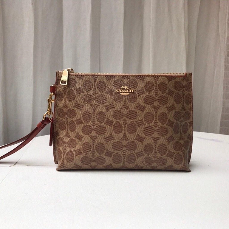 coach charlie pouch