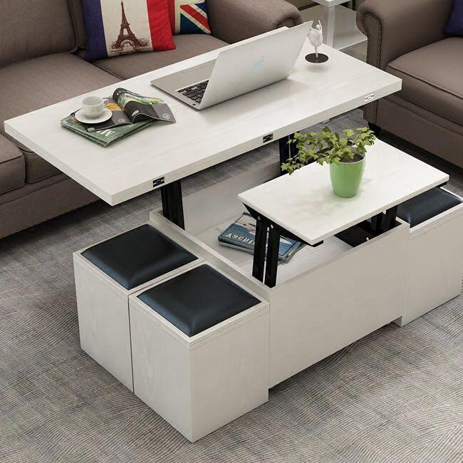 Multi Function Coffee Table (Category: Tables & Sets) located in Singapore. Submitted by radnaksi (Listing ID 1020280067, Image 2). Description: Multi Functional Coffee Table + 4 Stools ~ ✅ Solid wood frame ✅ Able to withstand up to 100kg load ✅ Waterproof table top for easy cleaning ✅ Storage compartment in every stool ✅ Heavy duty wheels with brakes ~ Table Dimension: 1200W x 600D mm 2 Adjustable Heights: 450 & 687mm ~ $460 with FREE Delivery! 
