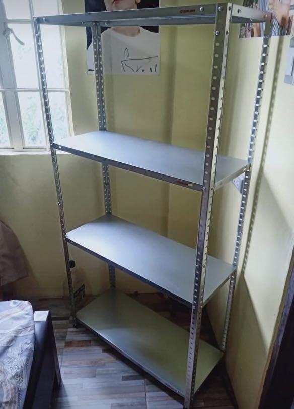 Shelves RACK SALE cabinet (Category: Shelves, Cabinets & Racks) located in Bulacan. Submitted by mark88821 (Listing ID 1020198321, Image 1). Description: Galvanized All Metal Shelves Size: L29.5xW12xH58" inches W75xD30xH146 cm 4 Layers/Adjustable Galvanized Metal not ordinary metal with anti rust properties 30 kilos capacity per layer Paint it with your own color using Spray Paint (optional) Brand New Easy to Assemble Value for Money For Light it