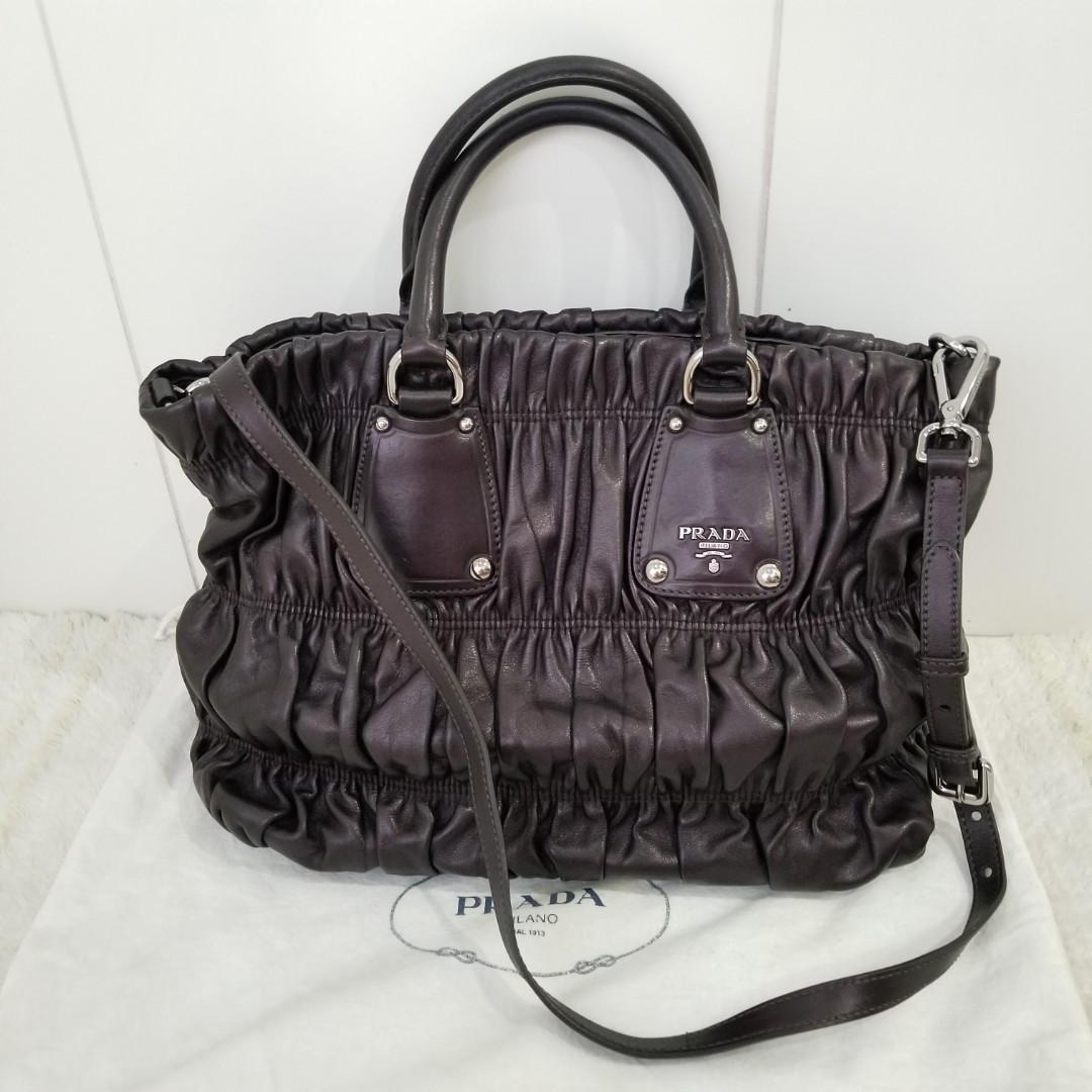 Prada Nappa Leather Eggplant color (Category: Purses & Pouches) located in Pasig City. Submitted by powerly75 (Listing ID 1020438302, Image 1). Description: Authentic Excellent condition No scuffings only light scratches on the leather Clean inside and out Size: 10 x 14 x 5 inches Inclusions: dust bag and strap Free shipping within Metro Manila after BPI/Gcash payment Text for inquiries: 09985301150.