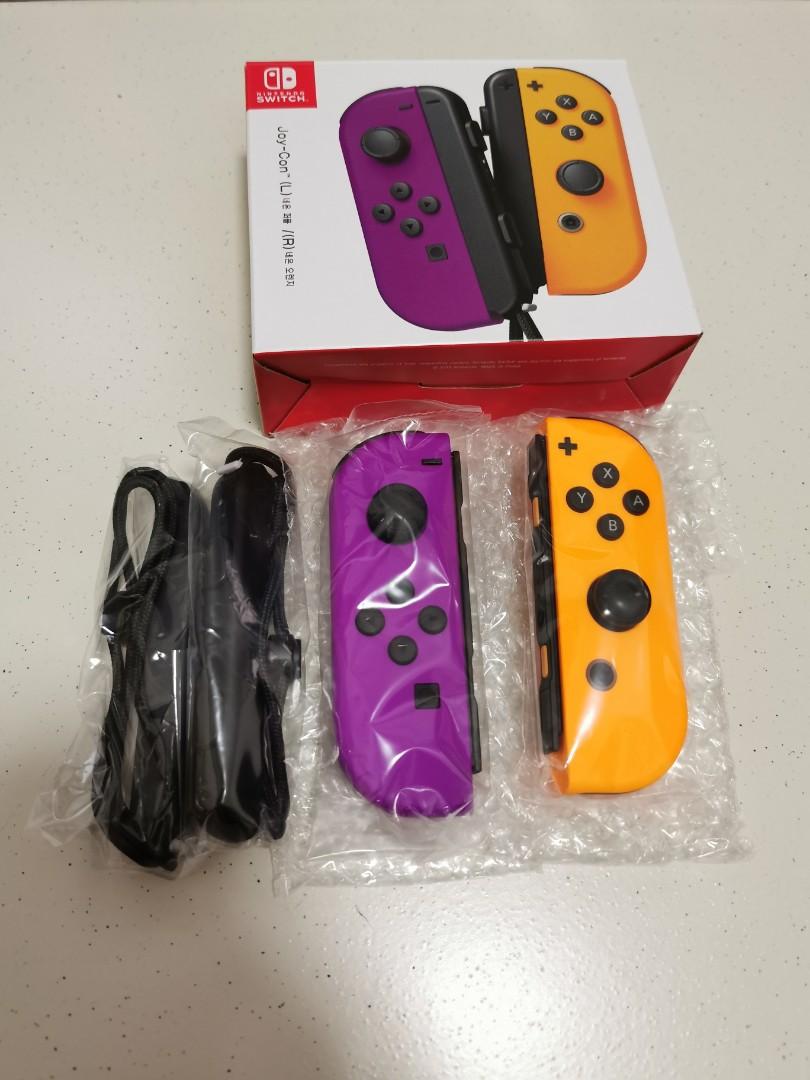 orange and purple video game console