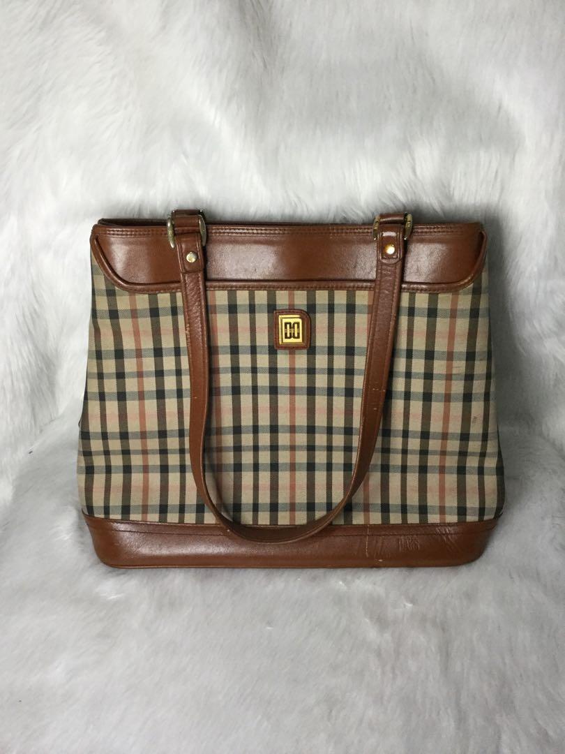 Daks bag price outlet list