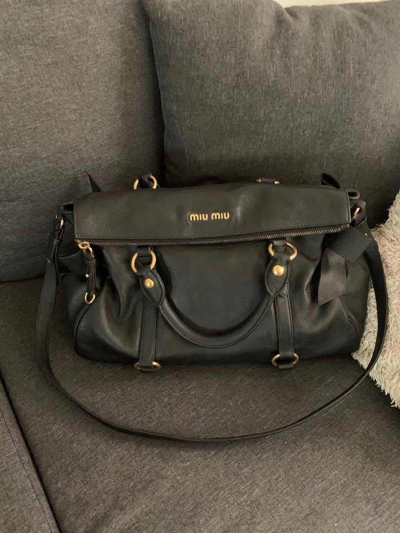 Miu miu bow bag (Category: Luxury Bags & Wallets) located in Manila. Submitted by imsojelica (Listing ID 1020624380, Image 1). Description: Preloved miu miu bow bag Recolored to black from beige Ipag bag spa nyo na lang to have leather reconditioned All in all very good condition .