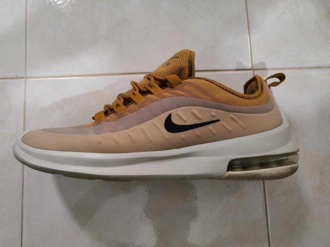 nike axis gold