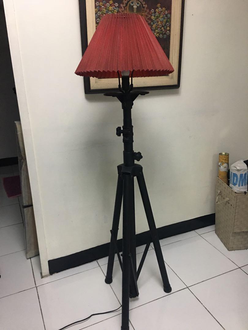 red tripod floor lamp
