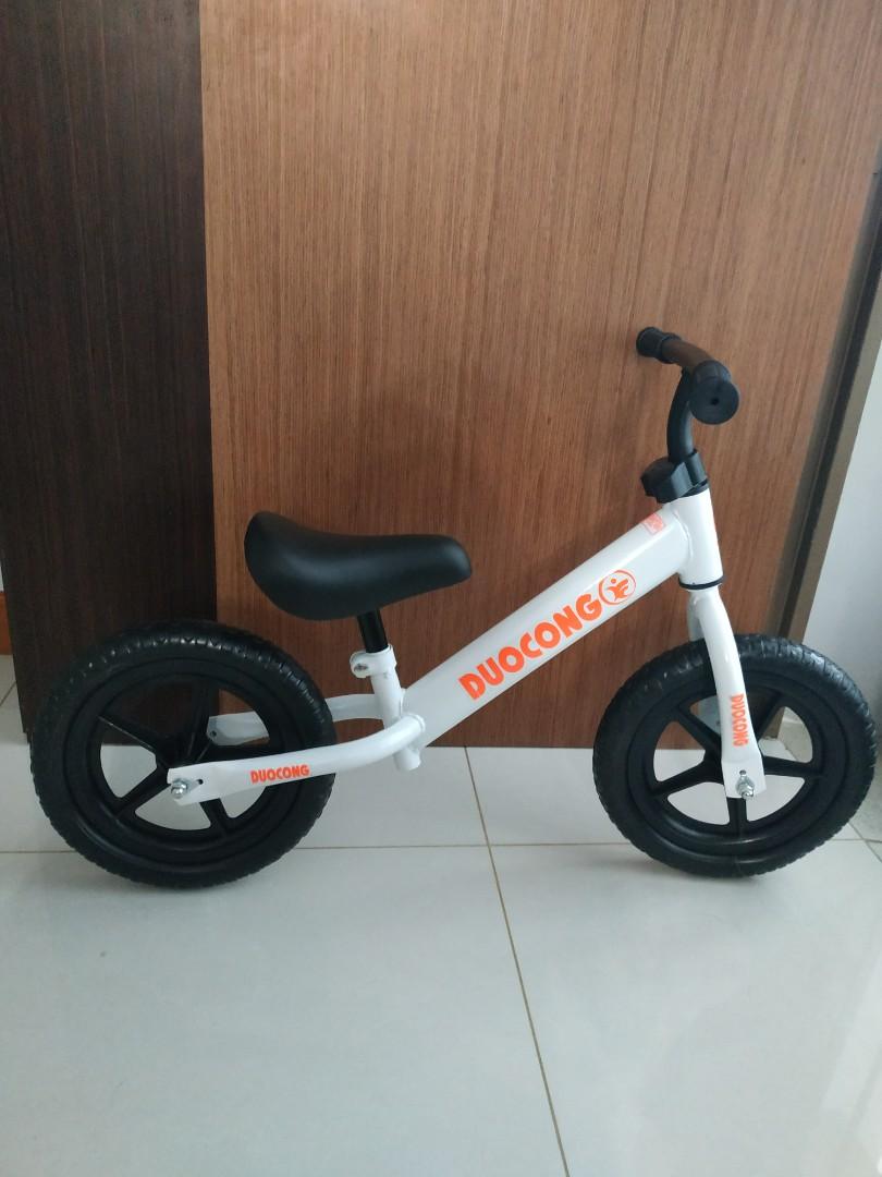 white toddler bike