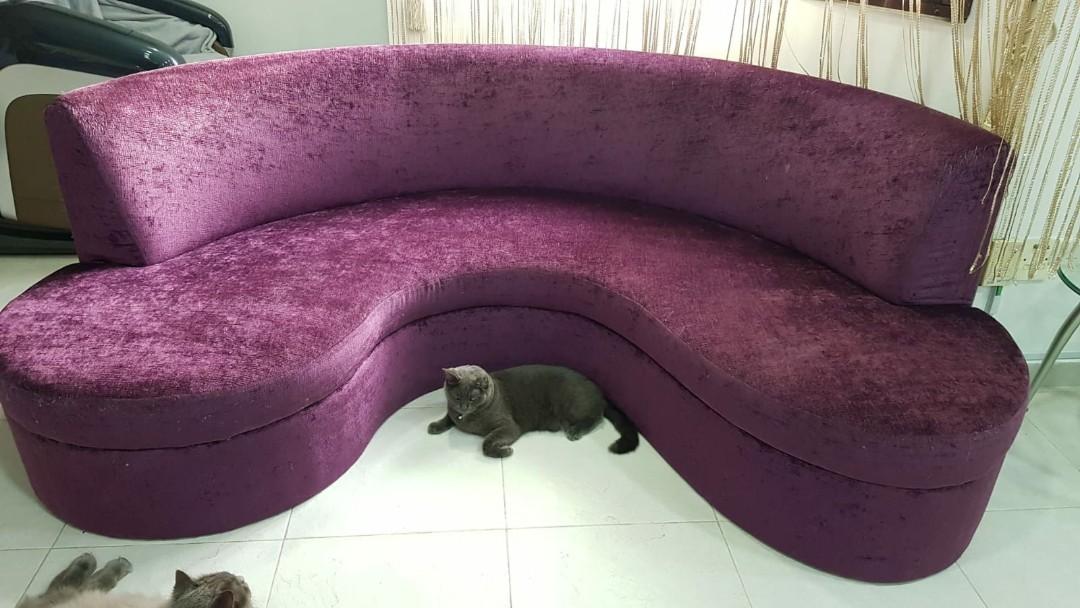 Designer sofa (Category: Sofas) located in Singapore. Submitted by flamingpink (Listing ID 1020911621, Image 1). Description: Designer sofa. Foam, seat & backrest are still in good condition as we usually cover it with a fleece blanket. Except the back are being scratched by our pet cats as seen in the picture. Letting go cheap before there's more damaged done by our cats. Please arrange your own transport..