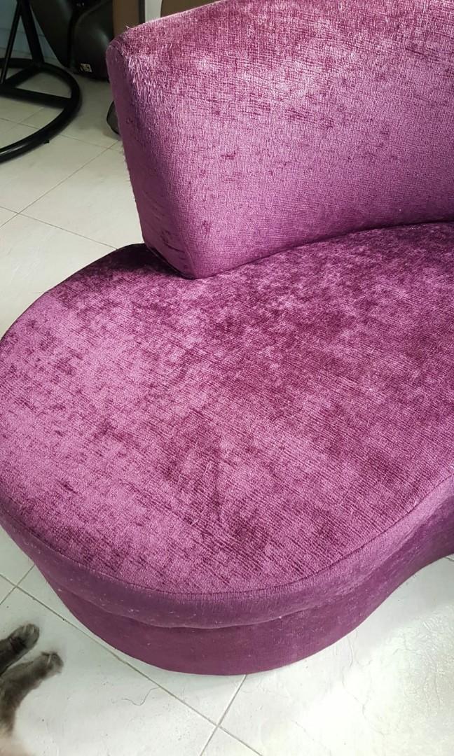 Designer sofa (Category: Sofas) located in Singapore. Submitted by flamingpink (Listing ID 1020911621, Image 2). Description: Designer sofa. Foam, seat & backrest are still in good condition as we usually cover it with a fleece blanket. Except the back are being scratched by our pet cats as seen in the picture. Letting go cheap before there's more damaged done by our cats. Please arrange your own transport..