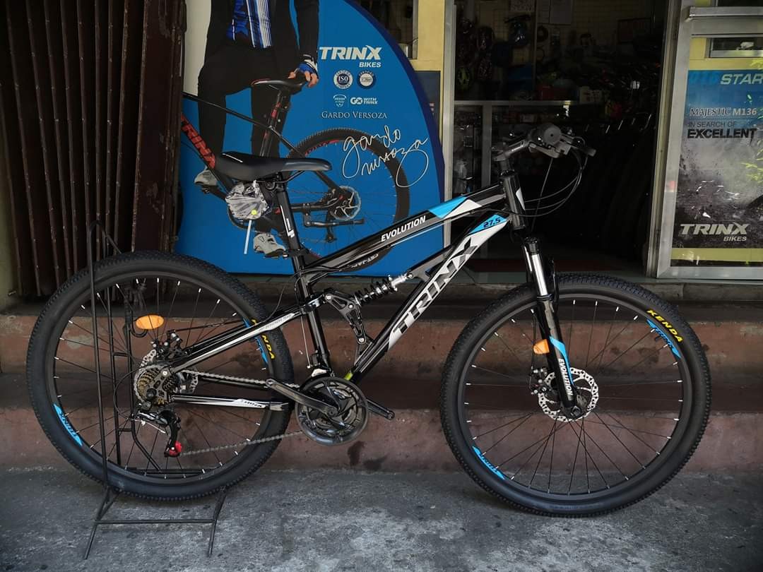 trinx full suspension mountain bike