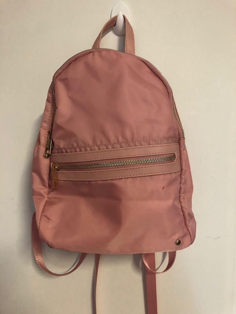 rose gold pink backpack