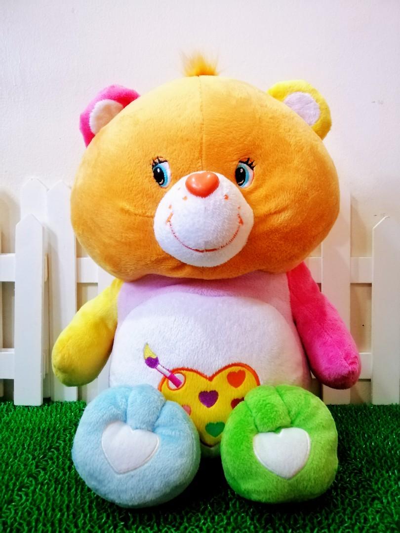 Multi coloured outlet care bear