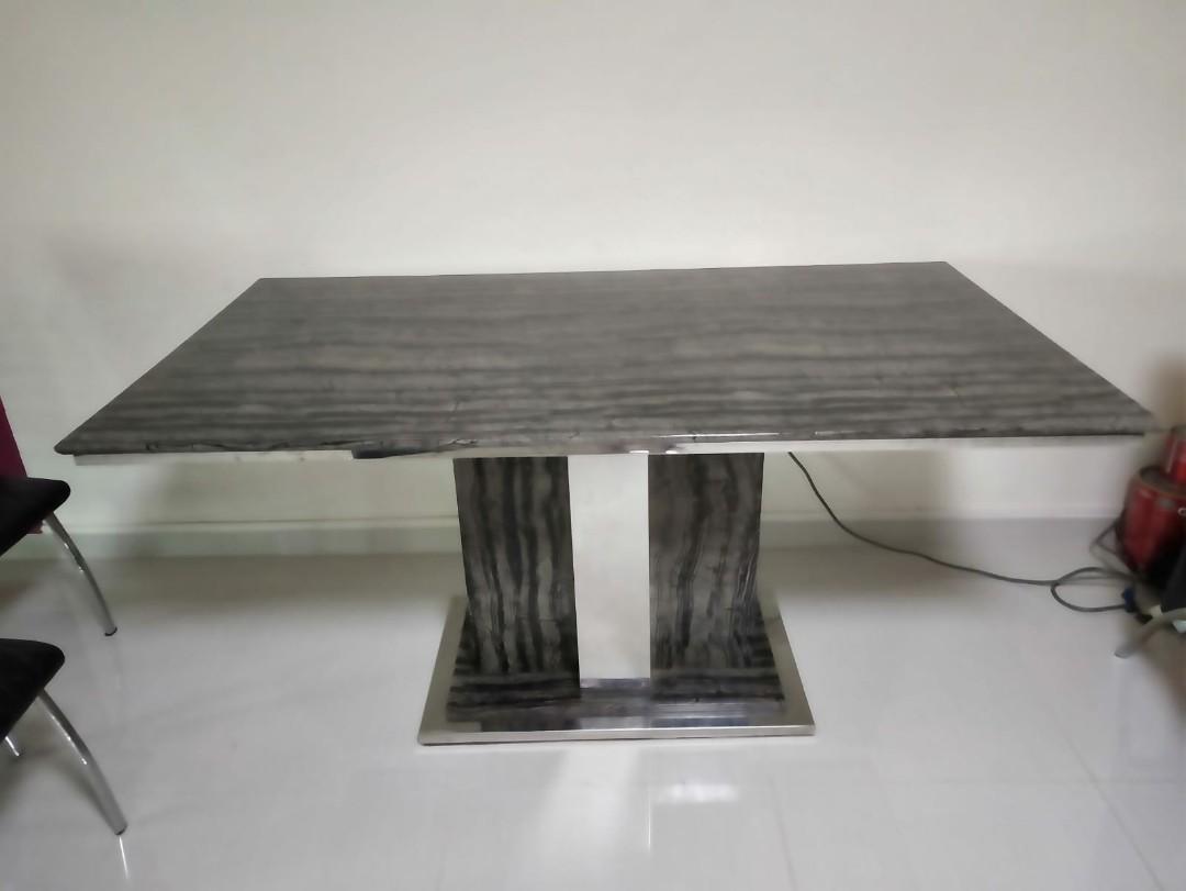 Dining Table (Category: Tables & Sets) located in Singapore. Submitted by syasin (Listing ID 1021265421, Image 1). Description: marble top and stainless Steel base.