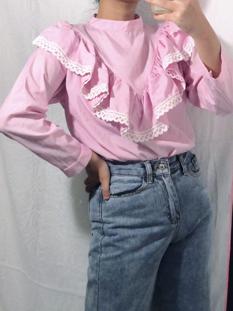 pink ruffle shirt