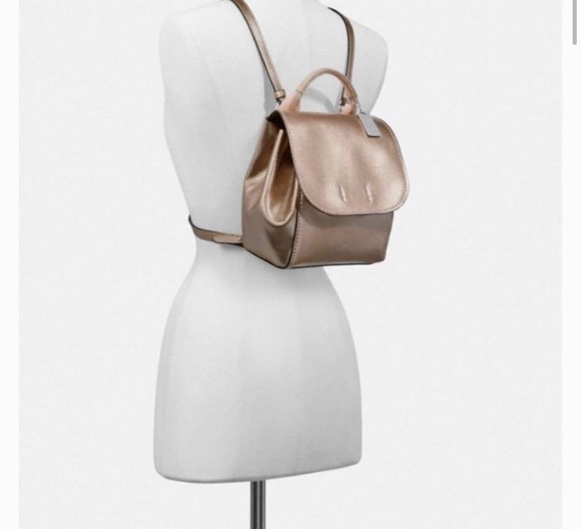 coach gold backpack