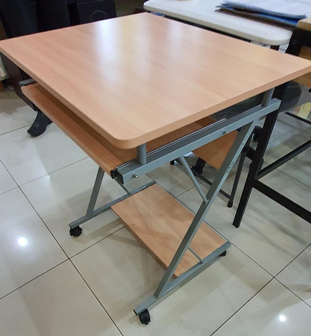 COMPUTER TABLE/ COMPUTER OFFICE TABLE (Category: Tables & Sets) located in Pasig City. Submitted by jdvntrdng (Listing ID 1021495717, Image 2). Description: COMPUTER OFFICE TABLE‼️ ✔with installed wheels for easy moving ✔with keyboard sliding tray ✔with single shelves below, for printer or for other items safe & one location positioning ✔very light & easy to setup ✔kids will love it ✔can also be used at any exhibit events ✔nicely laminated ✔size: