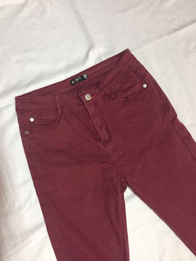 maroon ripped jeans