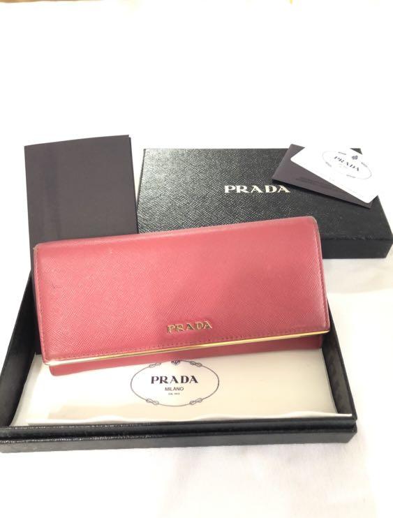 Prada saffiano flap store wallet