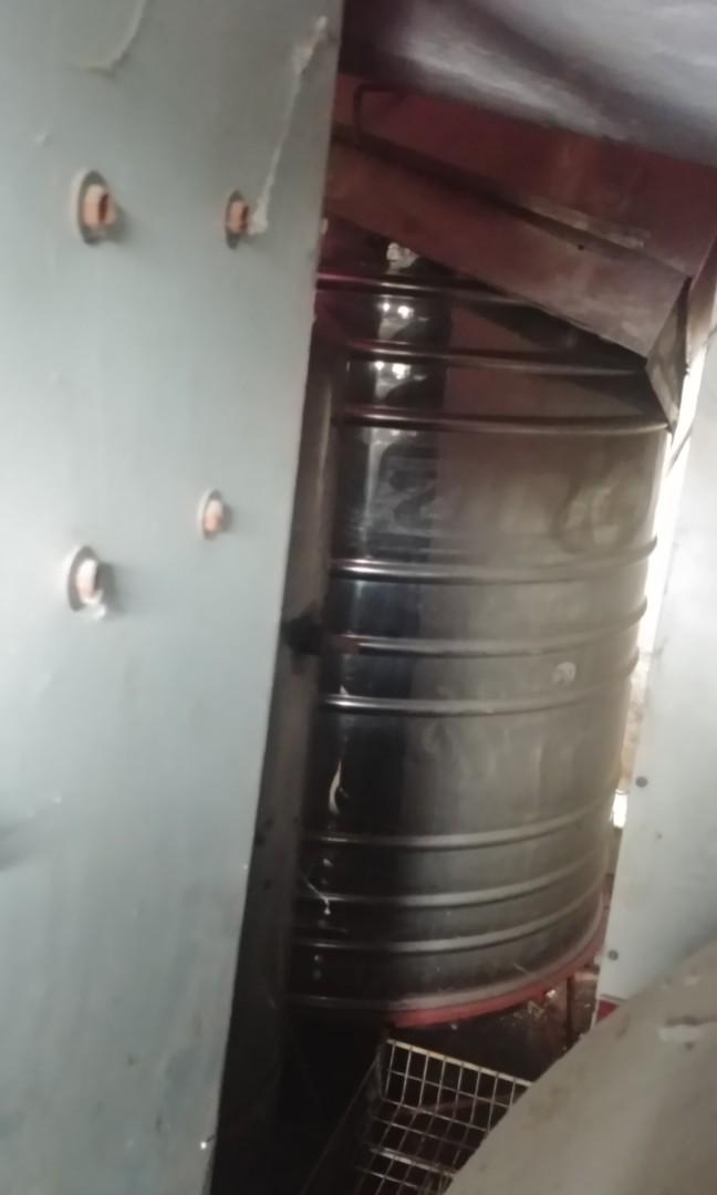 Stainless steel water tank (Category: Bathroom & Kitchen Fixtures) located in Manila. Submitted by flexi.flexi (Listing ID 1021326702, Image 3). Description: used vertical stainless water tank. with stand. about 4ft wide and 5 feet height. 1700liters.