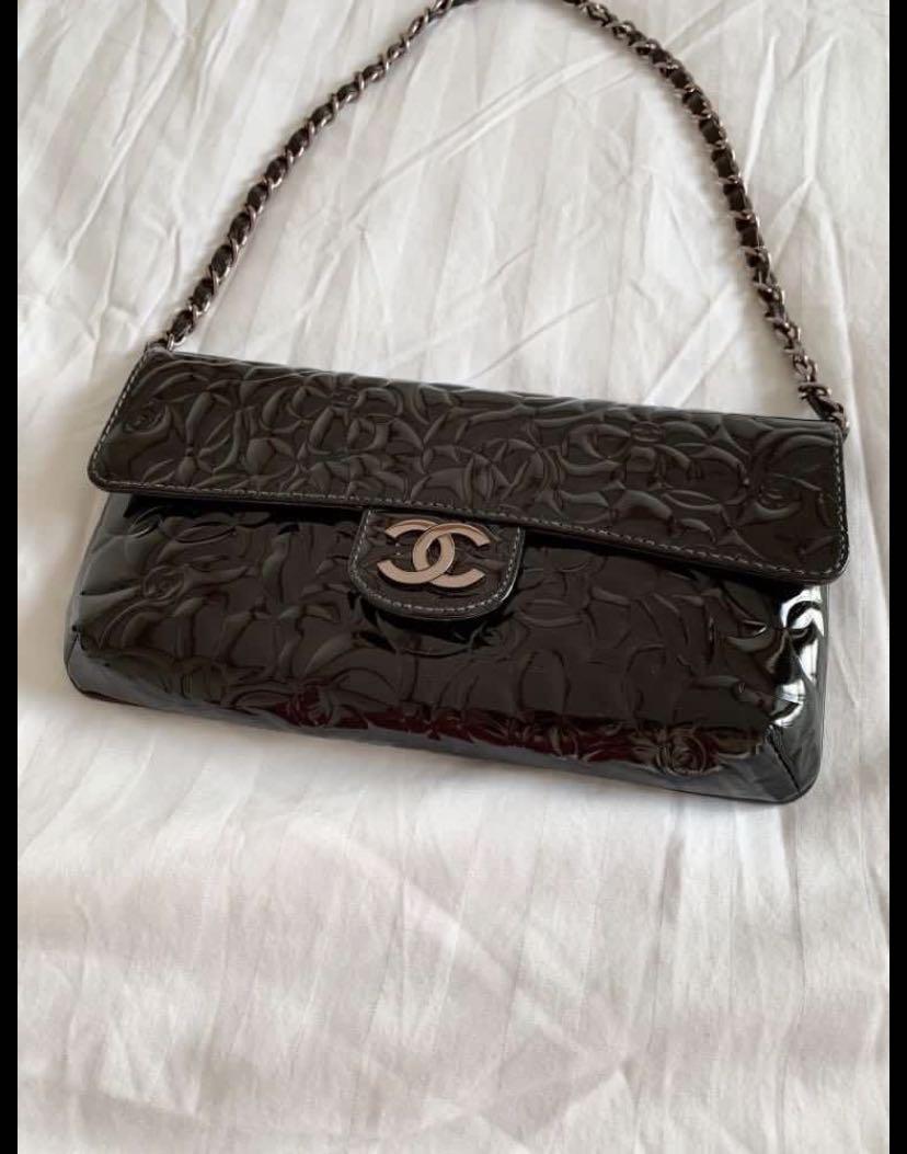 Authentic CHANEL black patent Camellia Embossed short chain clutch
