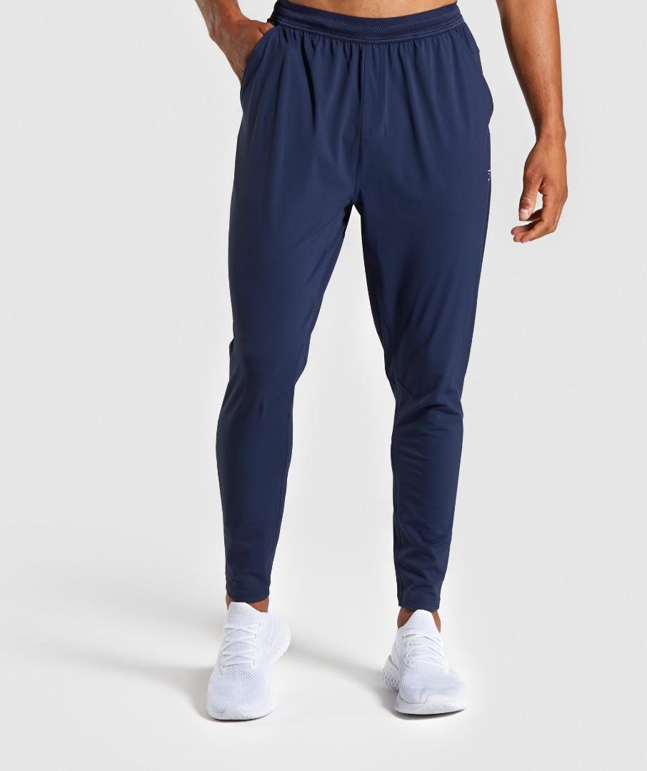 Gymshark Studio Joggers, Men's Fashion, Bottoms, Joggers on Carousell