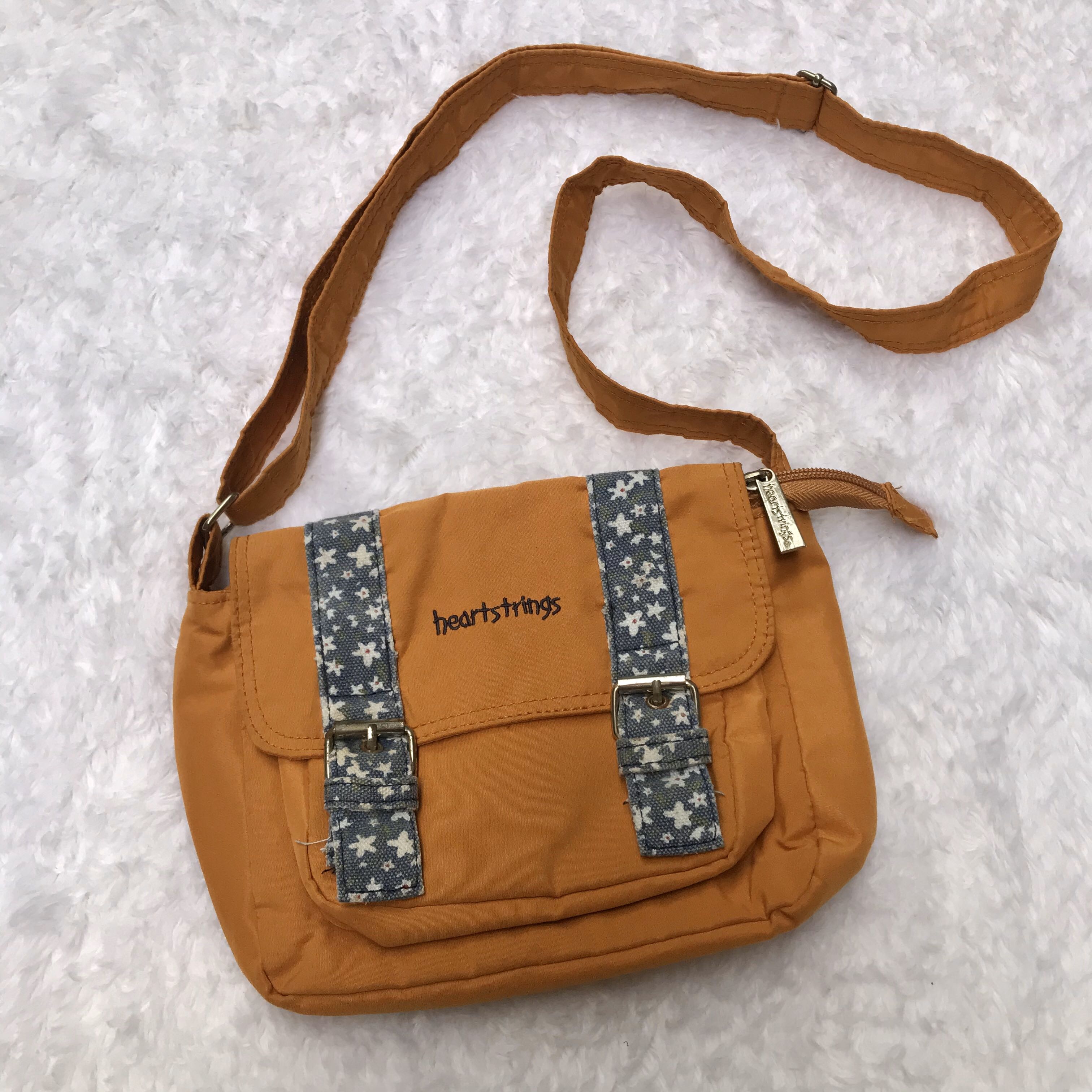 Heartstring sling bag store