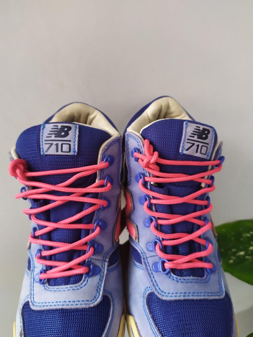 new balance 710 blue