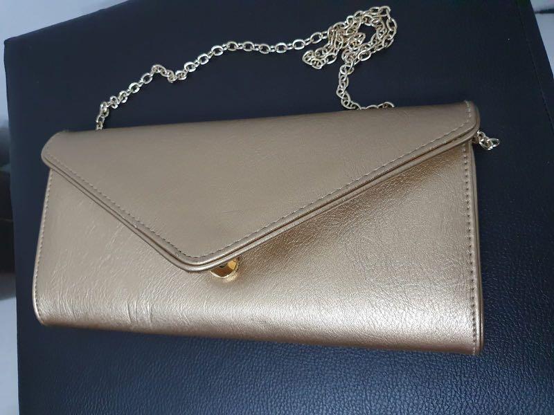 aldo gold clutch