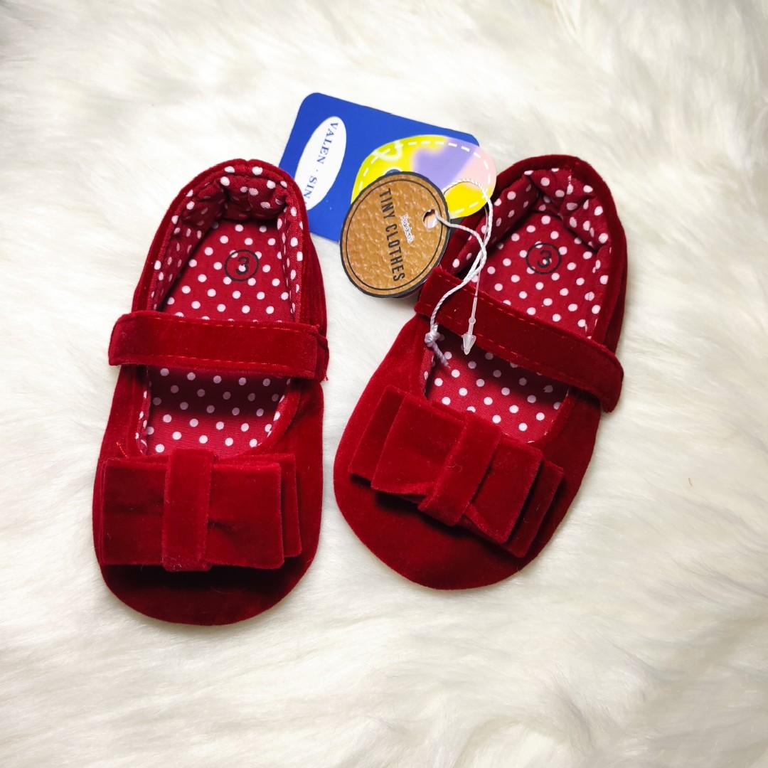 red infant shoes