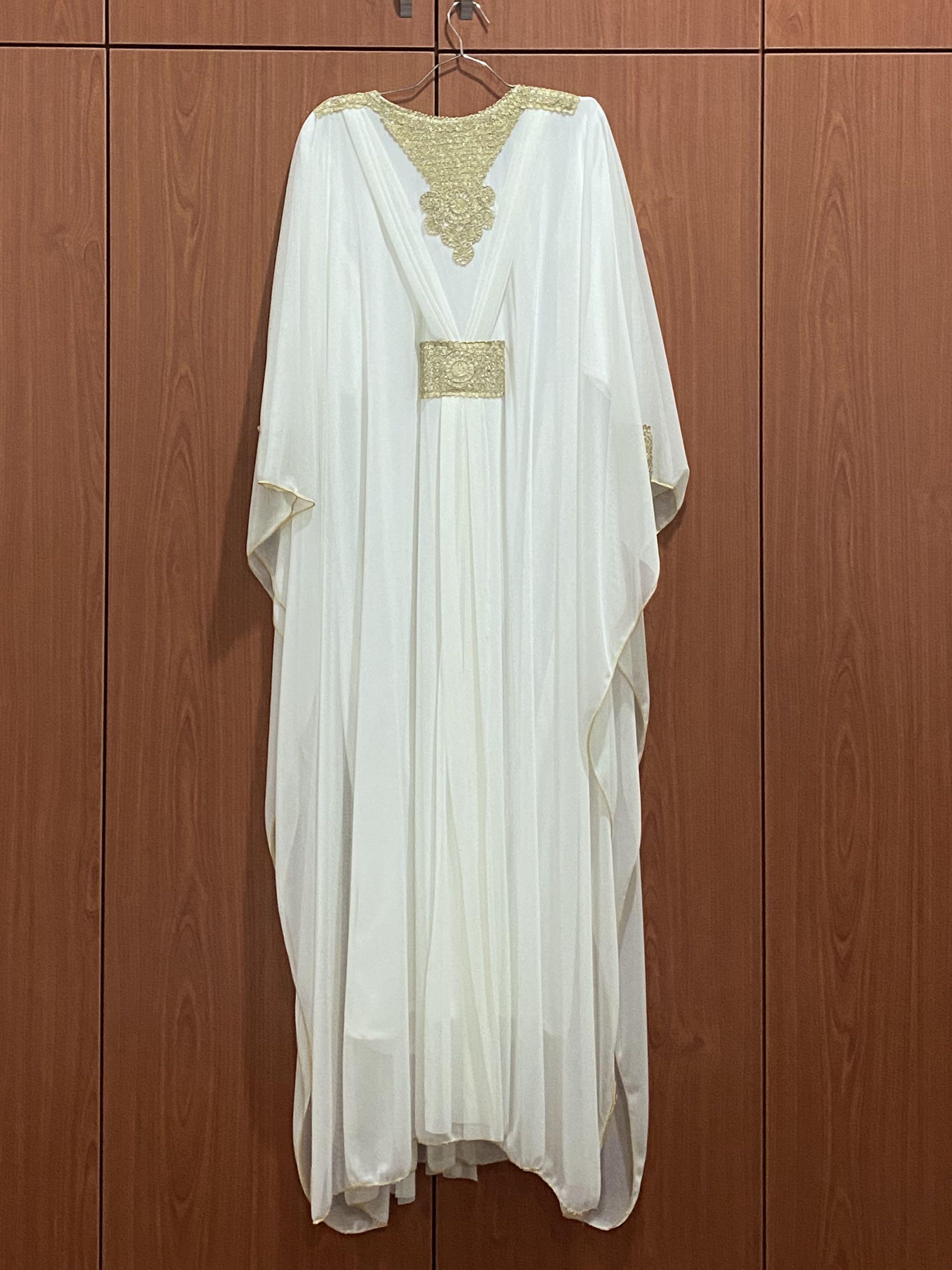 white and gold abaya