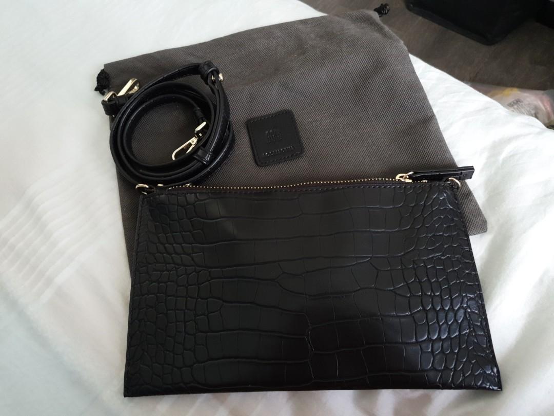 GG5 sling clutch (Category: Cross-body Bags) located in Singapore. Submitted by bigboysden (Listing ID 1021892647, Image 1). Description: .