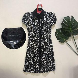 monochrome dress the executive