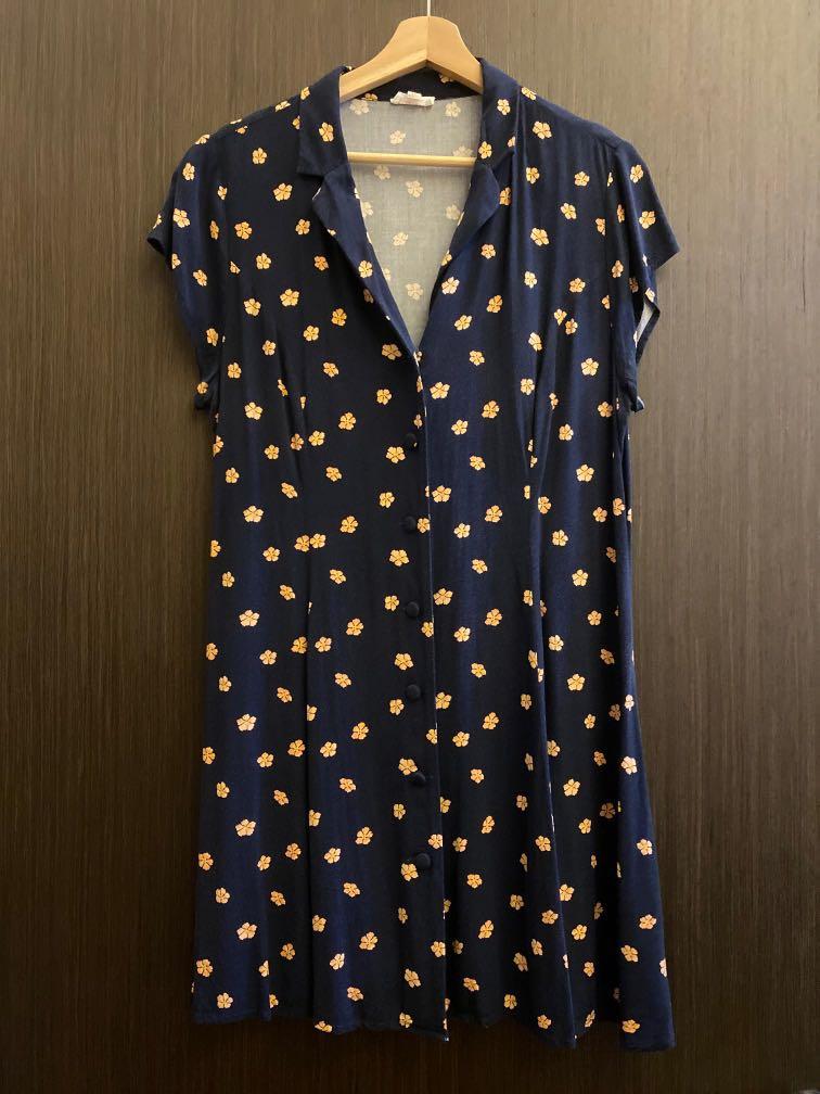 navy dress with orange flowers