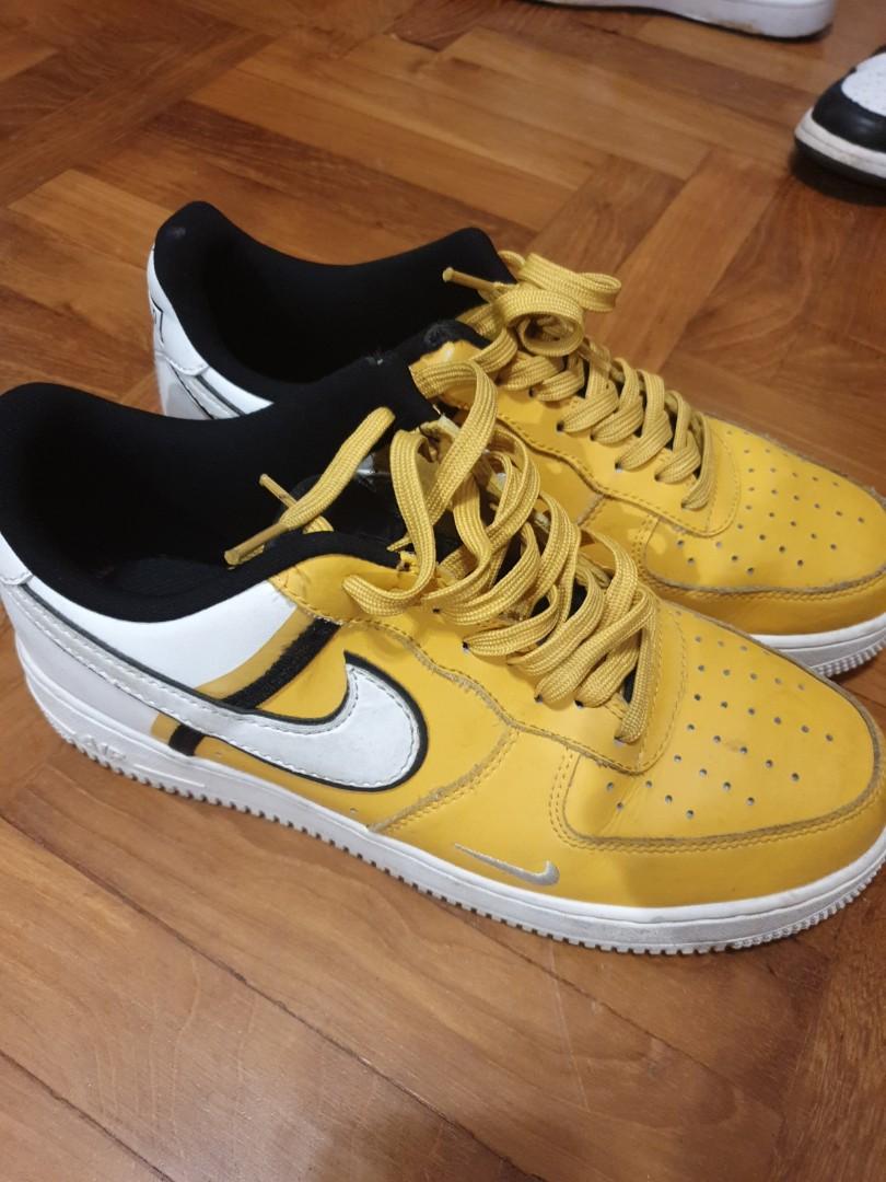 sneakers with yellow in them