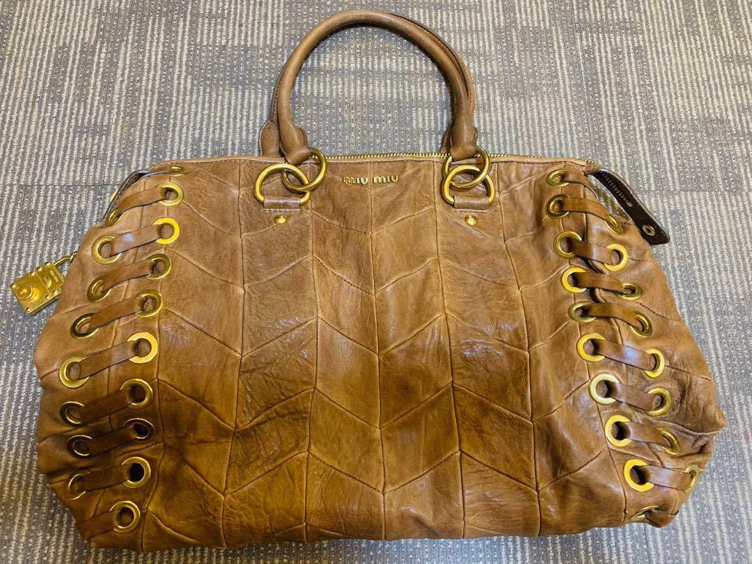 Preloved Authentic Miu Miu Hobo Bag (Category: Luxury Bags & Wallets) located in Pasig City. Submitted by mikebyme (Listing ID 1021908986, Image 2). Description: Good condition, minimal sign of usage.
